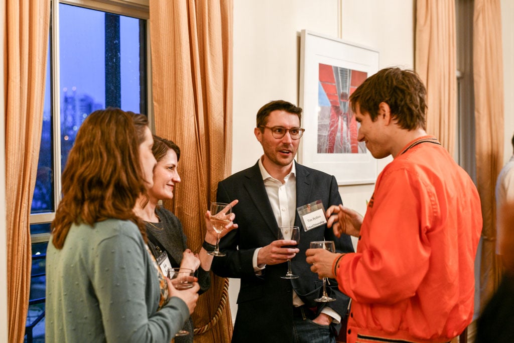People talking at a meetup event