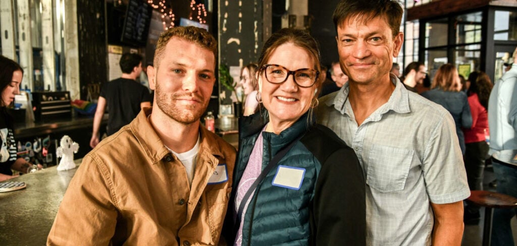 Three smiling dual Luxembourg citizens at a LuxCitizenship Event