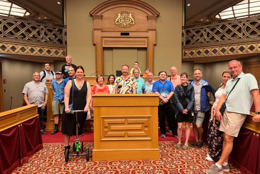 Group of people around a podium