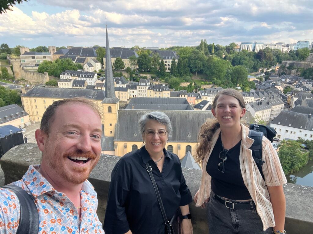 Daniel Atz of LuxCitizenship with two clients above the Grund in Luxembourg City
